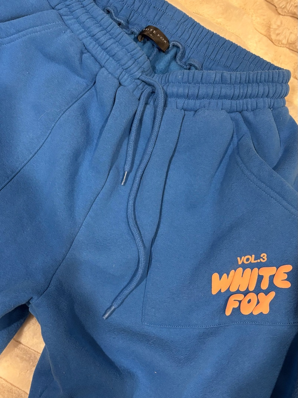 White Fox Boutique Blue Sweatpants with Orange Logo
